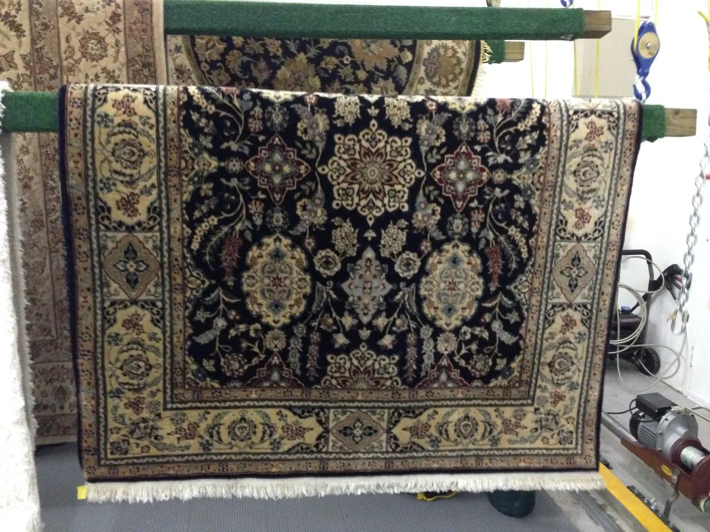 Oriental rug hanging on the drying rack